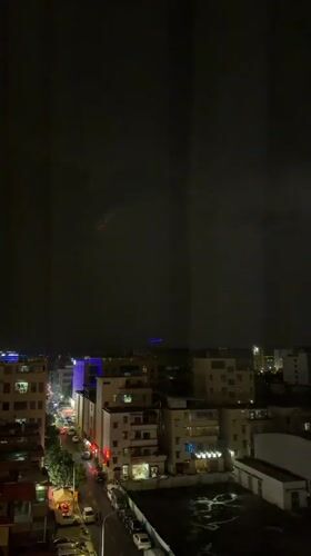 Stormy night aerials and seafood restaurant tanks in Guangzhou