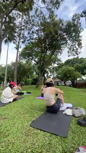 Outdoor yoga and morning exercise in a Chiang Mai park