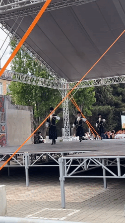 Traditional folk dancers perform outdoor show in Kaspiysk, Russia