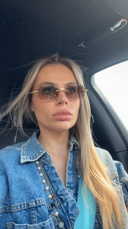 Peace sign selfie from the driver's seat in Dubai