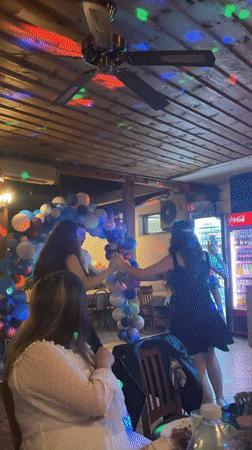 Young adults celebrate with dancing at Karlovo restaurant party