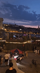 Dusk along the Danube, Budapest riverbank comes alive