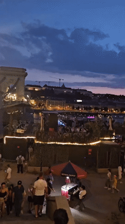 Dusk along the Danube, Budapest riverbank comes alive