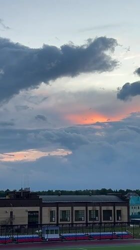 Dramatic sunset sky over Noviy, with a cat in tow