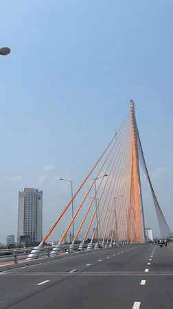 Cable-stayed bridge filmed from moving perspective in Da Nang