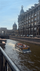 Morning tourist activities documented across Saint Petersburg's historic canals