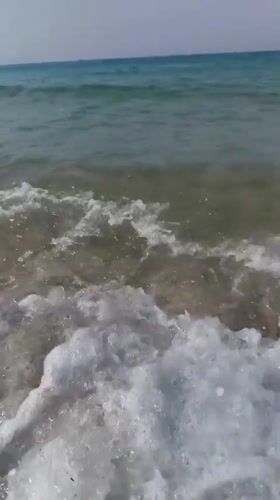 Beach day on the Vietnamese coast, kites, waves, and shoreside dining