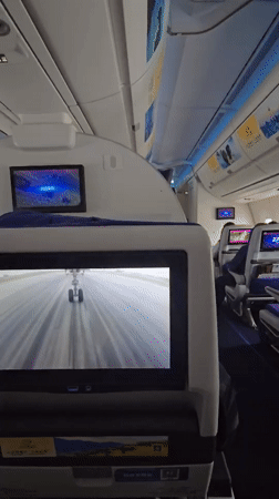 Passenger records in-flight camera view on entertainment system