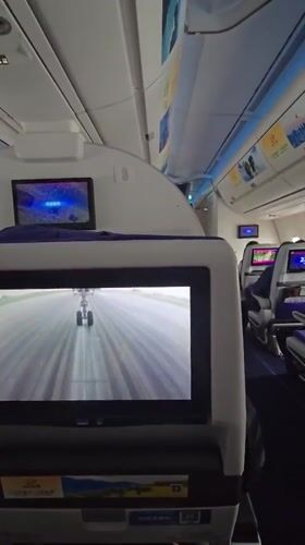Passenger records in-flight camera view on entertainment system