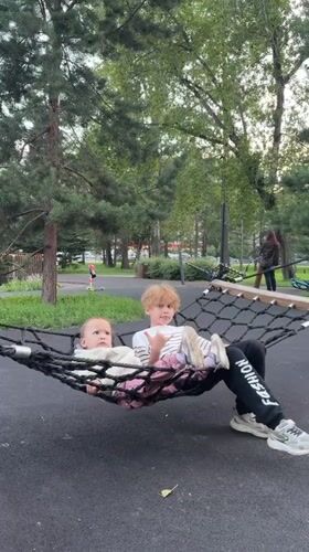 Afternoon in a Krasnoyarsk park, hammocks and greenery