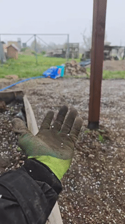 Spring graupel and snow documented in rural Belarus backyard