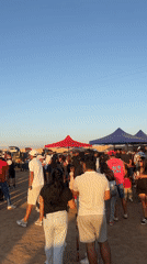 Desert gathering with tents observed near Arica, Chile