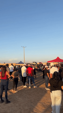 Desert gathering with tents observed near Arica, Chile