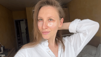Woman documents skincare routine with eye patches in Khimki