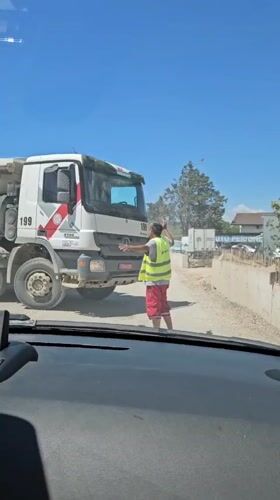 Ordinary moments captured in Montenegro: construction work, cat care