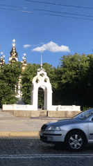 Golden-domed church filmed from street in San Martín de Porres