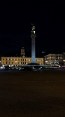 Evening monument and city lights observed in Tbilisi