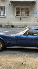 Vintage Corvette, antique baby carriage spotted on Tbilisi street
