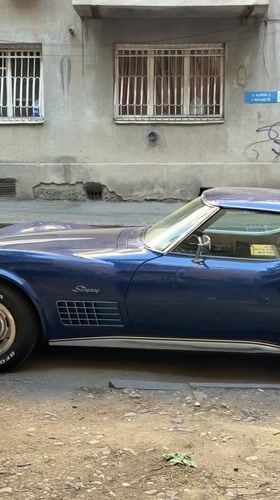 Vintage Corvette, antique baby carriage spotted on Tbilisi street
