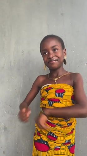 Girl in colorful outfit filmed in Badagry, Nigeria