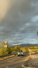Silver SUV drives through scenic Bulgarian countryside near Barakovo