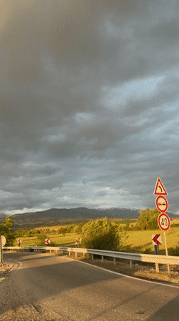 Silver SUV drives through scenic Bulgarian countryside near Barakovo