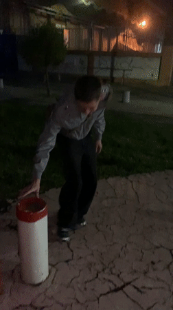 Buenos Aires residents captured in casual street moments, percussion play