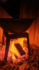 Outdoor cooking session over wood fire in Belarus