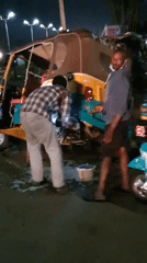 Bukuru streets at night: trucks, tricycles, and roadside life