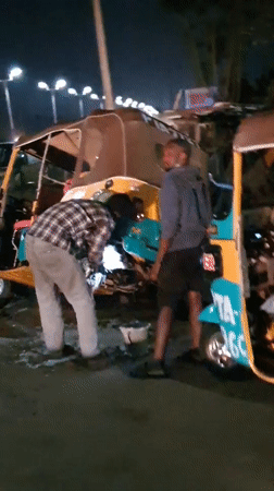 Bukuru streets at night: trucks, tricycles, and roadside life