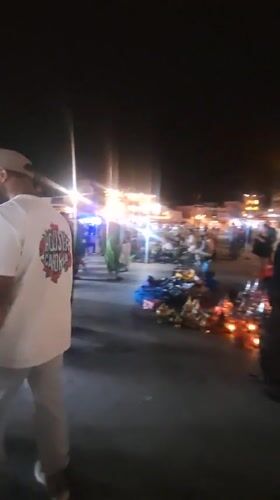 Evening pedestrian activity captured in central Marrakesh