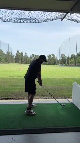 Late-night golf practice session observed at Burnaby driving range