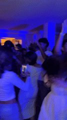 Club night and backstage glam under colored lights