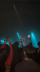 Concert crowd records performance with phones in Moscow venue
