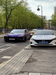 Purple Lamborghini spotted with police car in Moscow