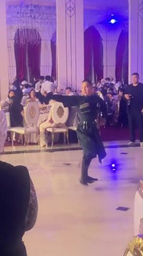 Wedding reception features traditional Georgian dancing in Astana hall