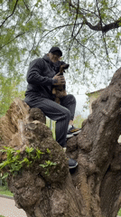 Couple enjoys morning with dachshunds in Moscow park