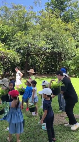 Rice planting day with kids at a Ban Pa Tio paddy