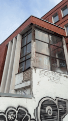 Brick building with graffiti documented in Riga