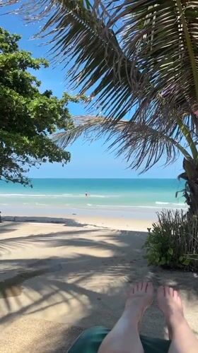 Peaceful morning beach moment captured in Baan Chaweng, Thailand