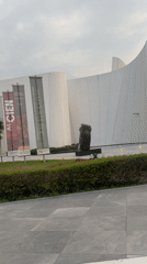 Modern white building with sculpture documented in Tlaxcalancingo