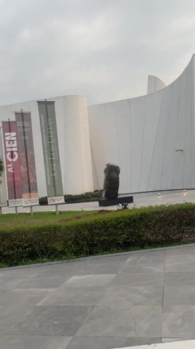 Modern white building with sculpture documented in Tlaxcalancingo