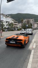 Orange Lamborghini and daily life scenes captured in Budva