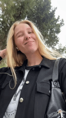 Woman records playful selfie video in Budva, Montenegro