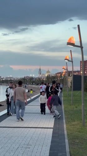 Evening stroll along Kokshetau waterfront as storm clouds gather