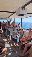Boat party off the Montenegrin coast near Sveti Stefan