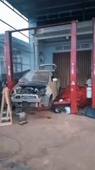 Auto repair shop operations documented in Xuân Long, Vietnam