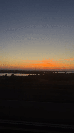 Sunset captured from moving vehicle on Israeli highway