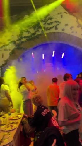 Live band performs at crowded restaurant gathering in Tbilisi