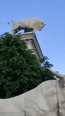 Urban sculptures, ornate fountain, recreational boating documented by witnesses